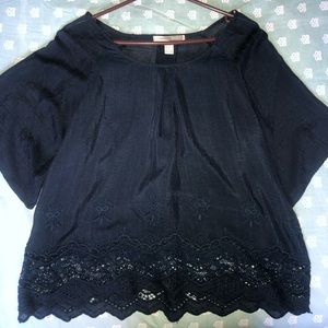 Navy blue flowing top with floral embroidery